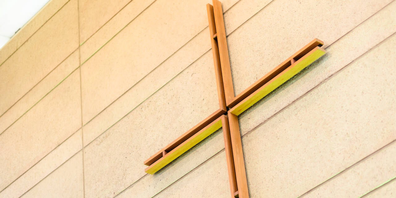 A cross on a church wall.