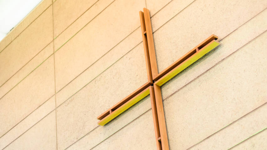 A cross on a church wall.